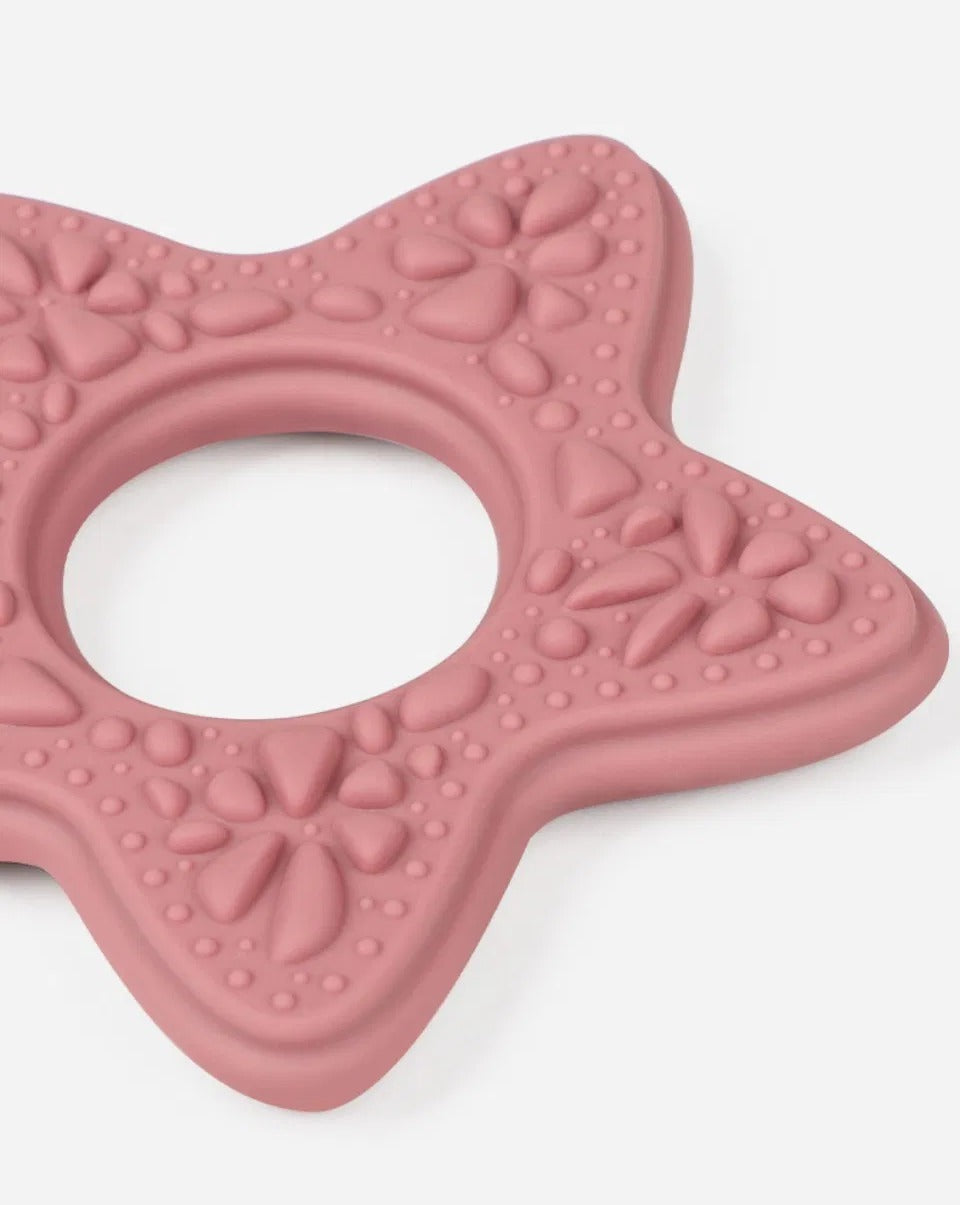 Close-up of Snuglet teether multi-texture surface