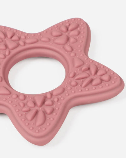 Close-up of Snuglet teether multi-texture surface
